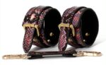 menottes de poignets snakine noir rose