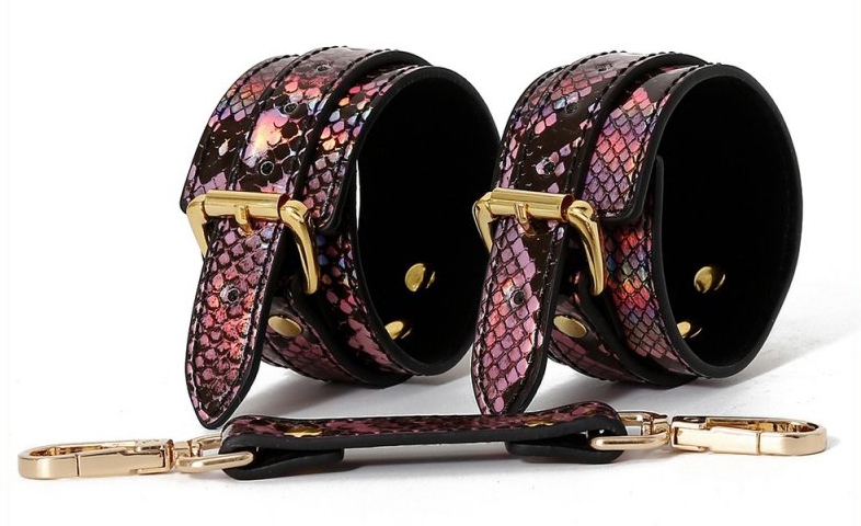 menottes de poignets snakine noir rose