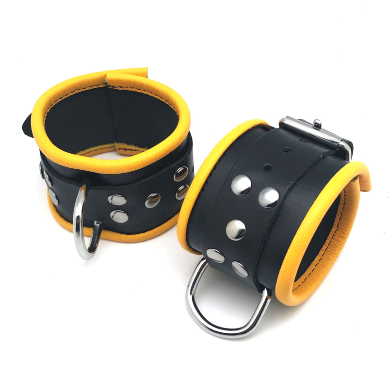 menottes en cuir pour poignets noir jaune 2
