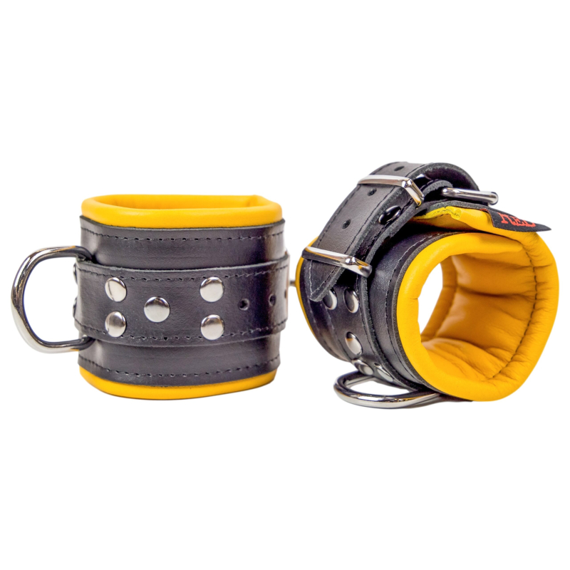 menottes en cuir rembourrees noir jaune 8 scaled