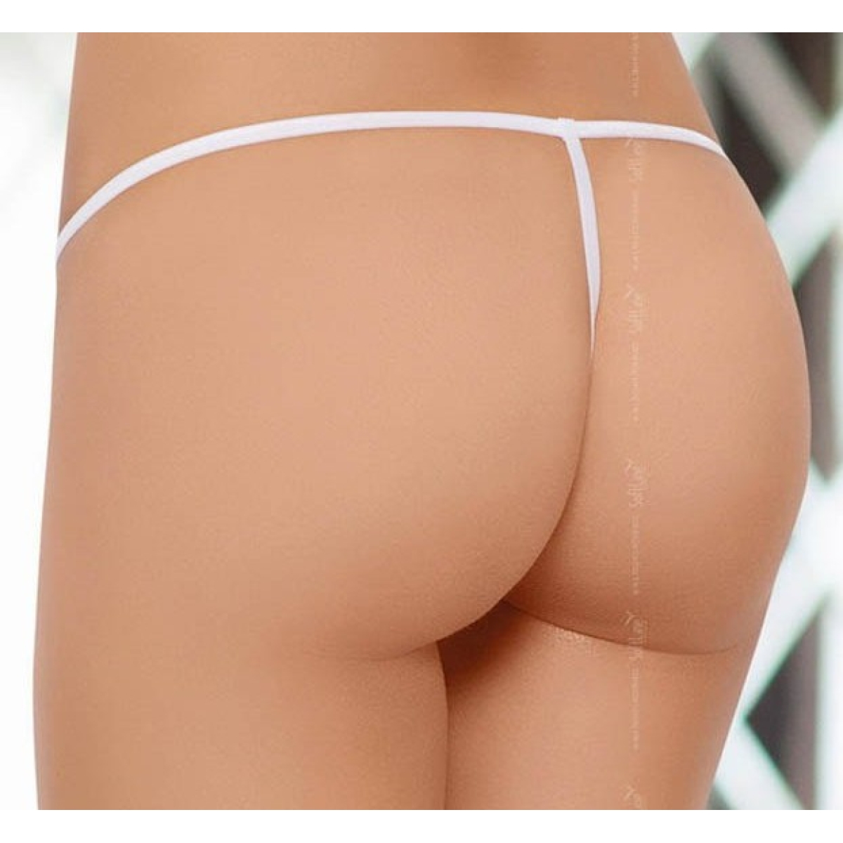 string ficelle blanc avec noeud ouvert sur l entrejambe 1